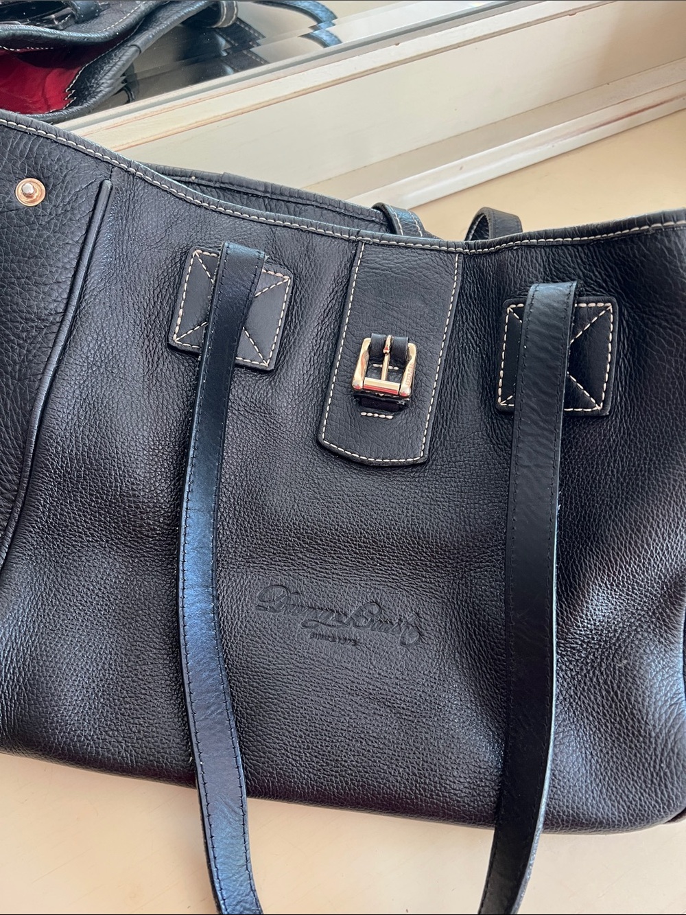 Dooney & Bourke Black Leather Tote with Gold Buckle
